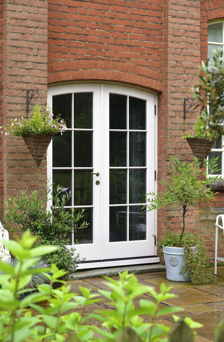 Bespoke arched french doors in Farrow & Ball Middleton Pink