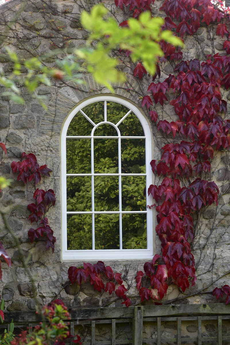 Bespoke fixed arched flush casement window