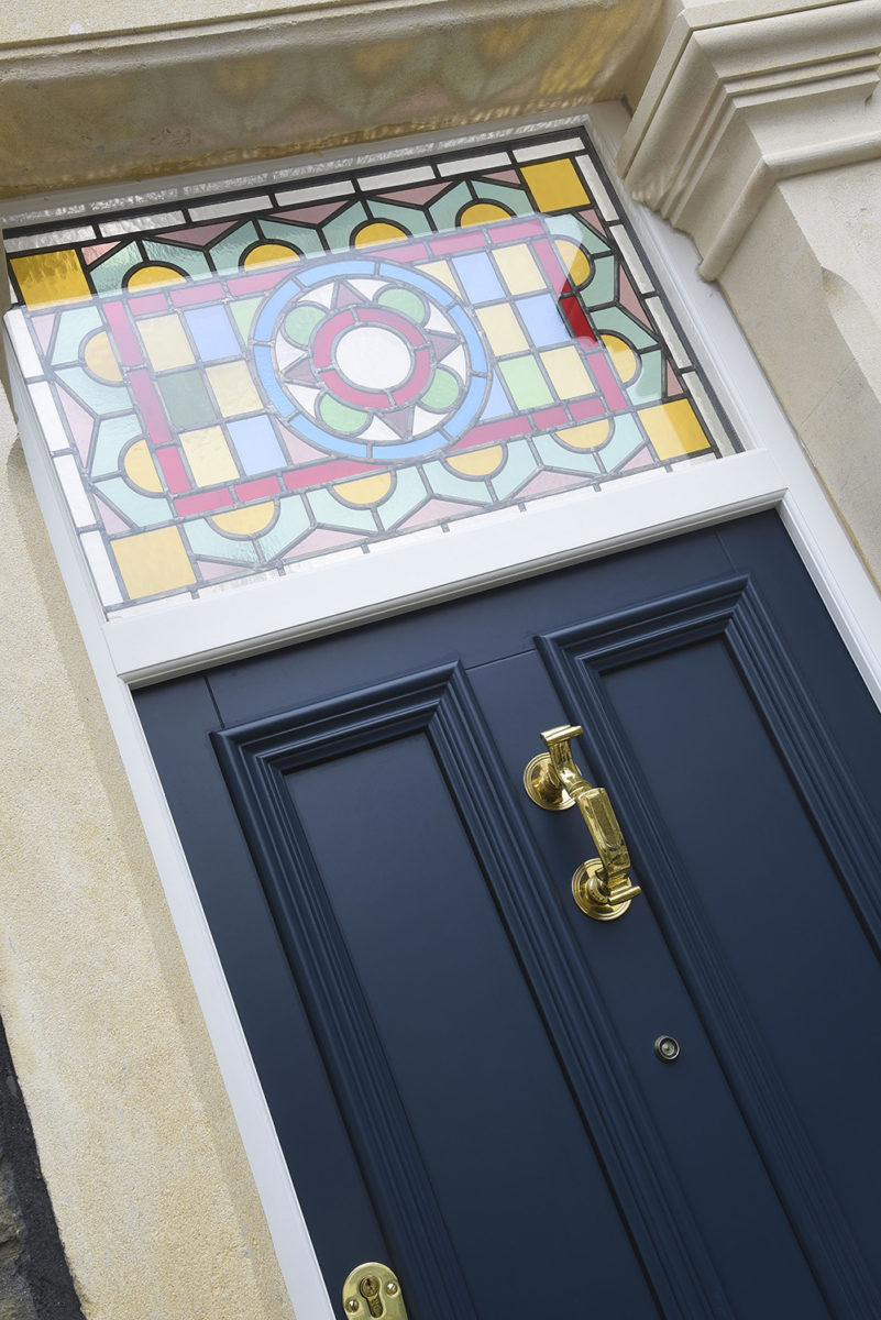 Bevington entrance door with toplight featuring bespoke stained glass design