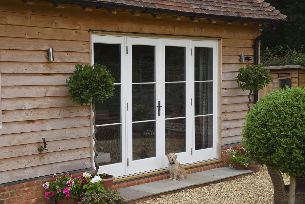 French doors with sidelights in new build countryside home