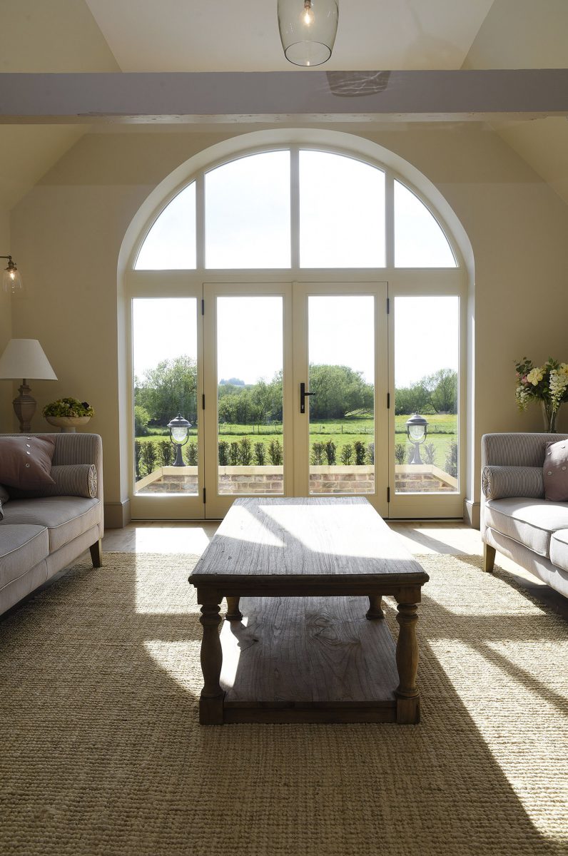 French doors with unique arched toplights