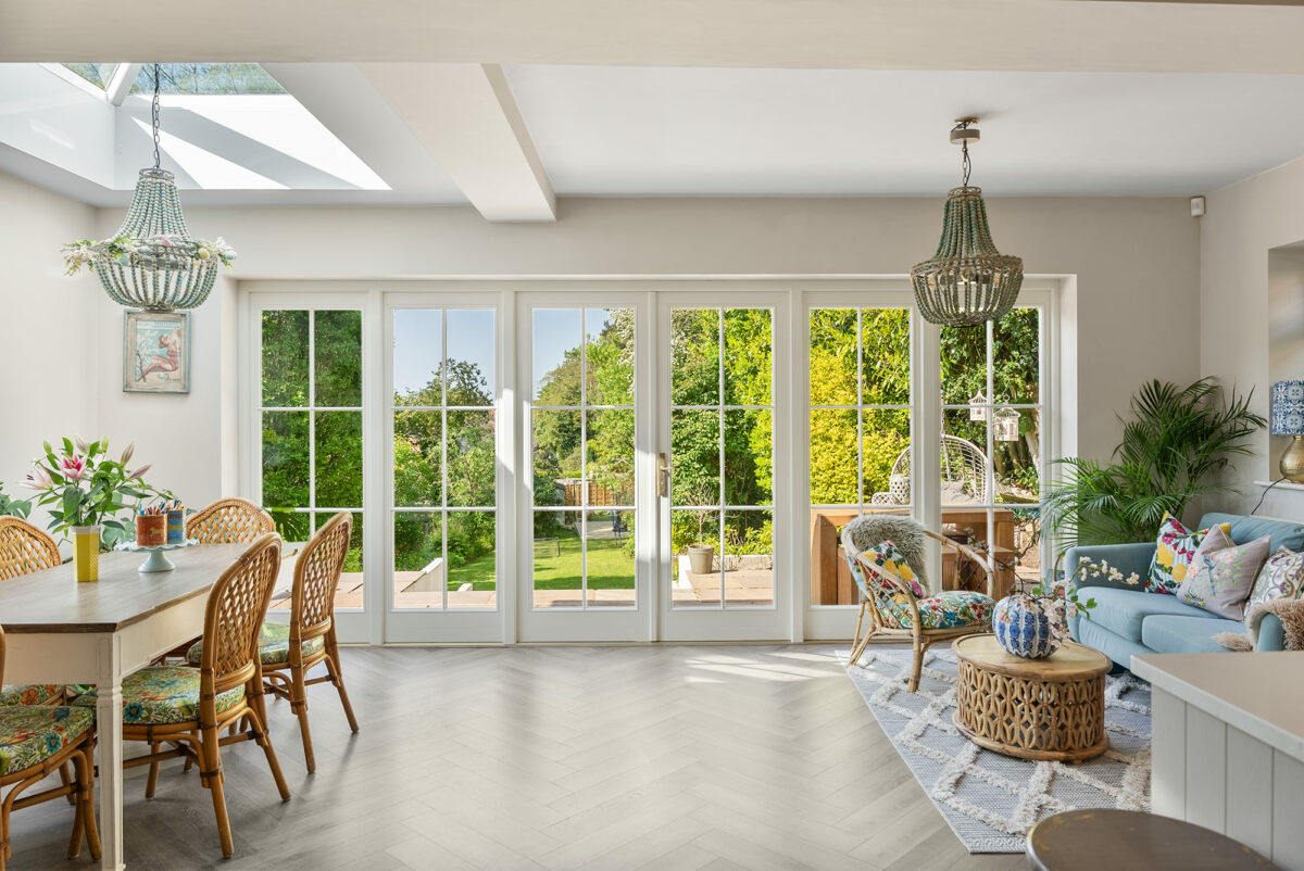 a large set of french doors in a light spacious room