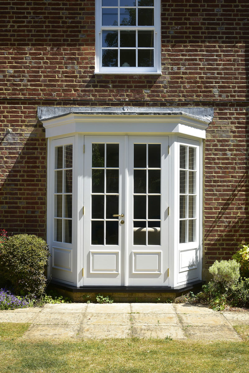 Listed French doors finished in White