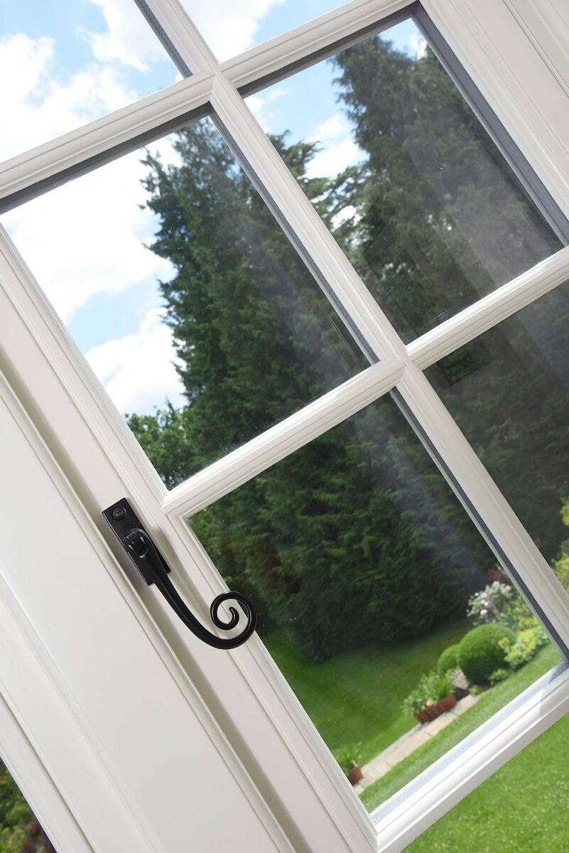 Timber-flush-casement-window-with-black-monkeytail-handle