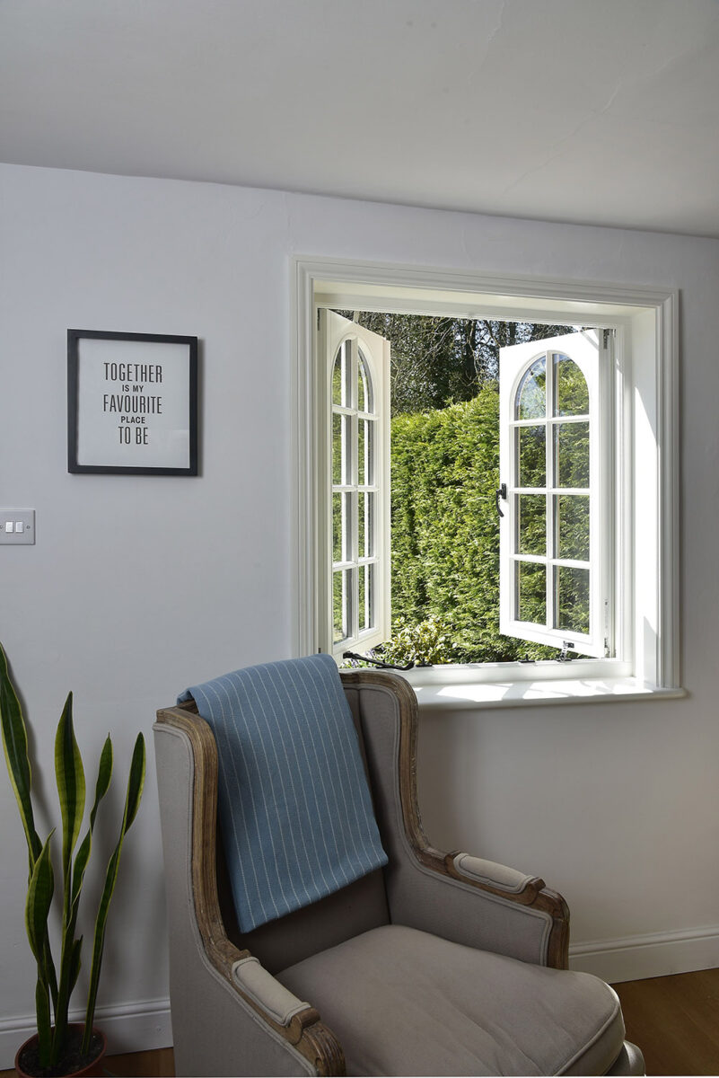 cottage casement windows with swept heads