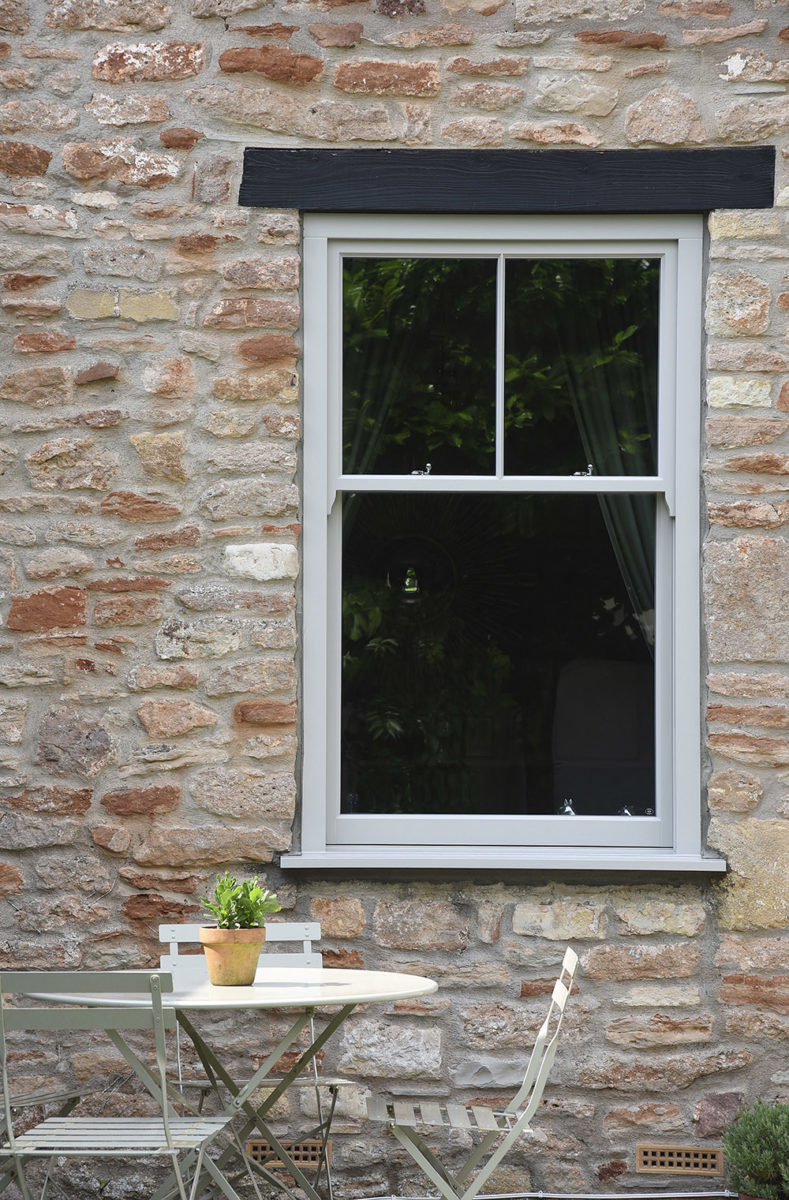 slim sash window finished in Porcelain