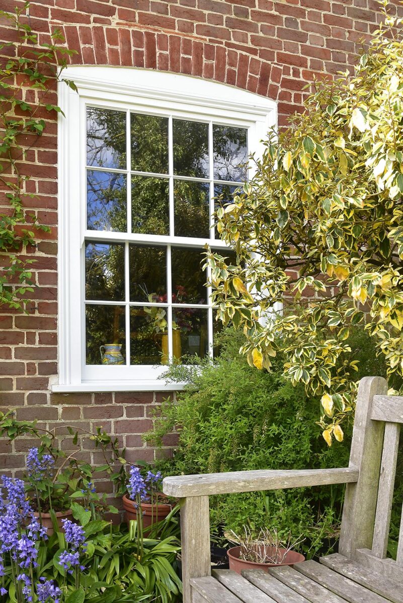 traditional slim sash window finished in white
