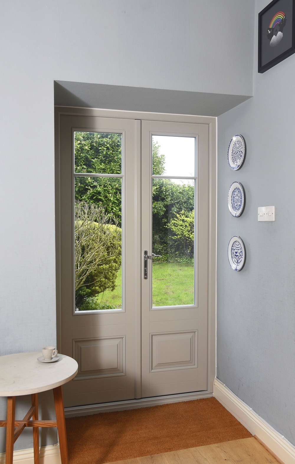 French Doors finished in ‘Porcelain’ with 18mm astragal glazing bars and Chrome Chatsworth handle.