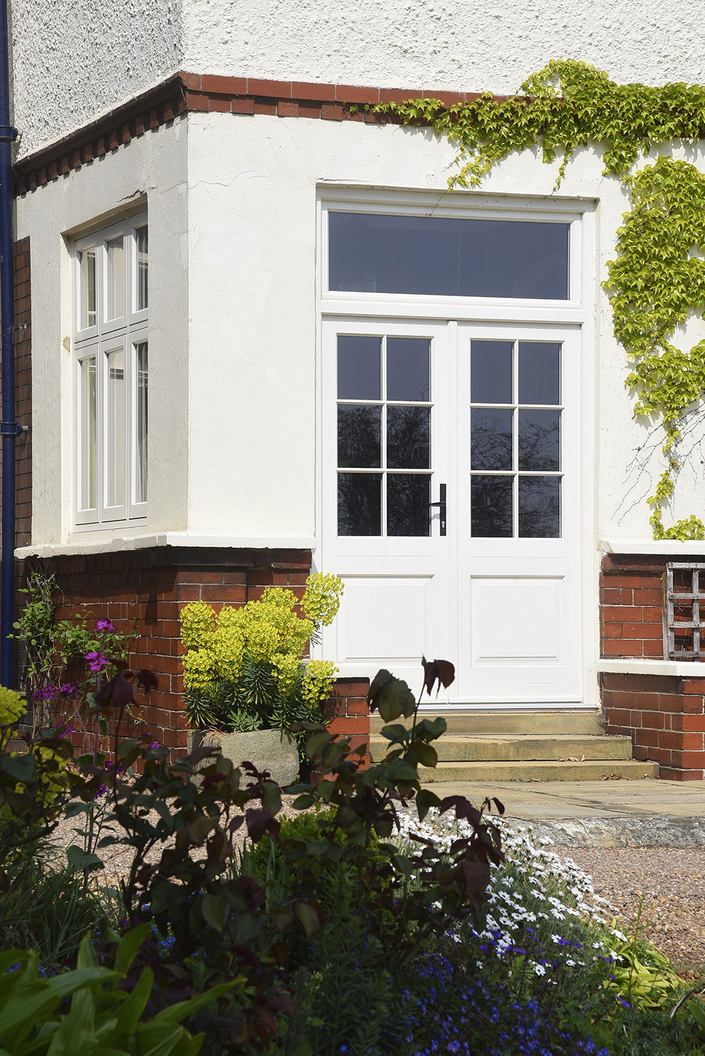 Timber French doors finished in Cream