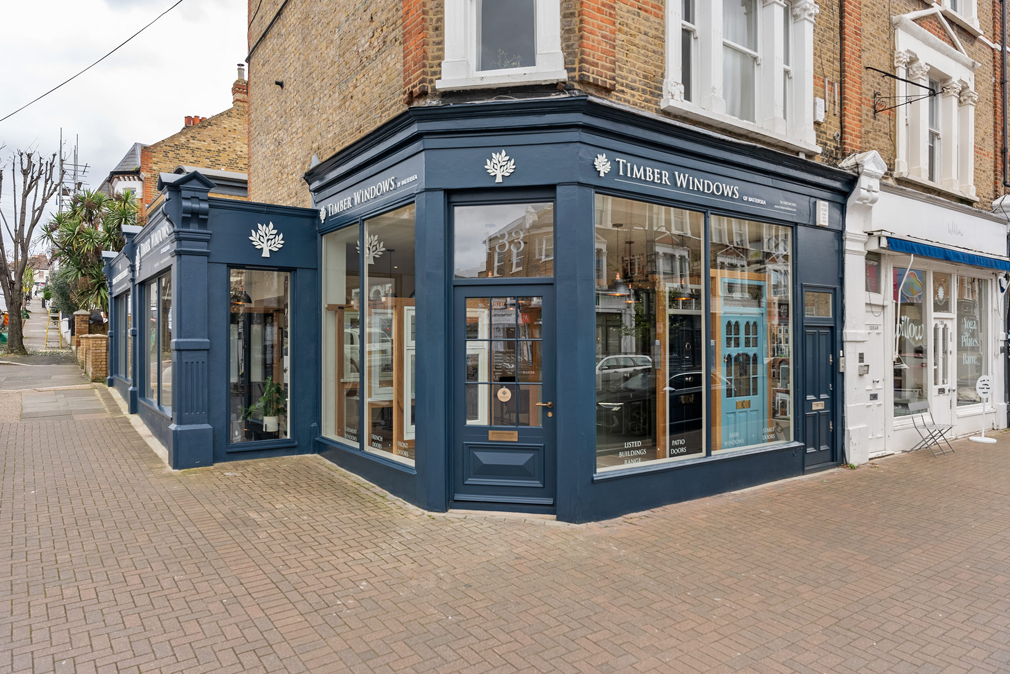 a blue timber windows showroom on a high street